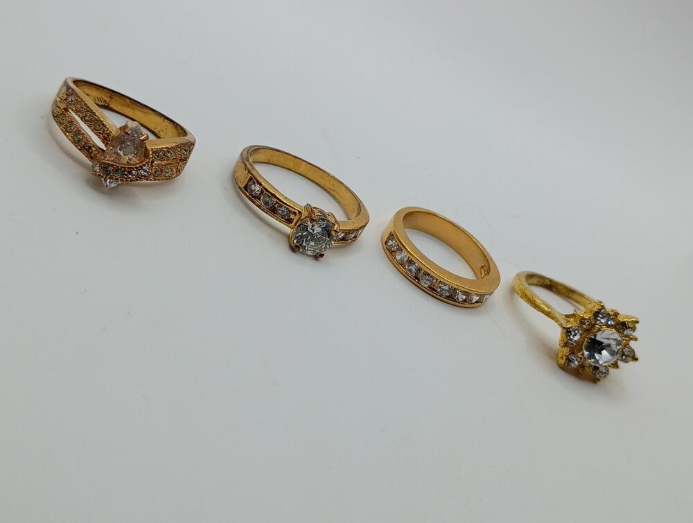 Lot of 4 Gold-Tone Rhinestone Rings – Sizes 7–10